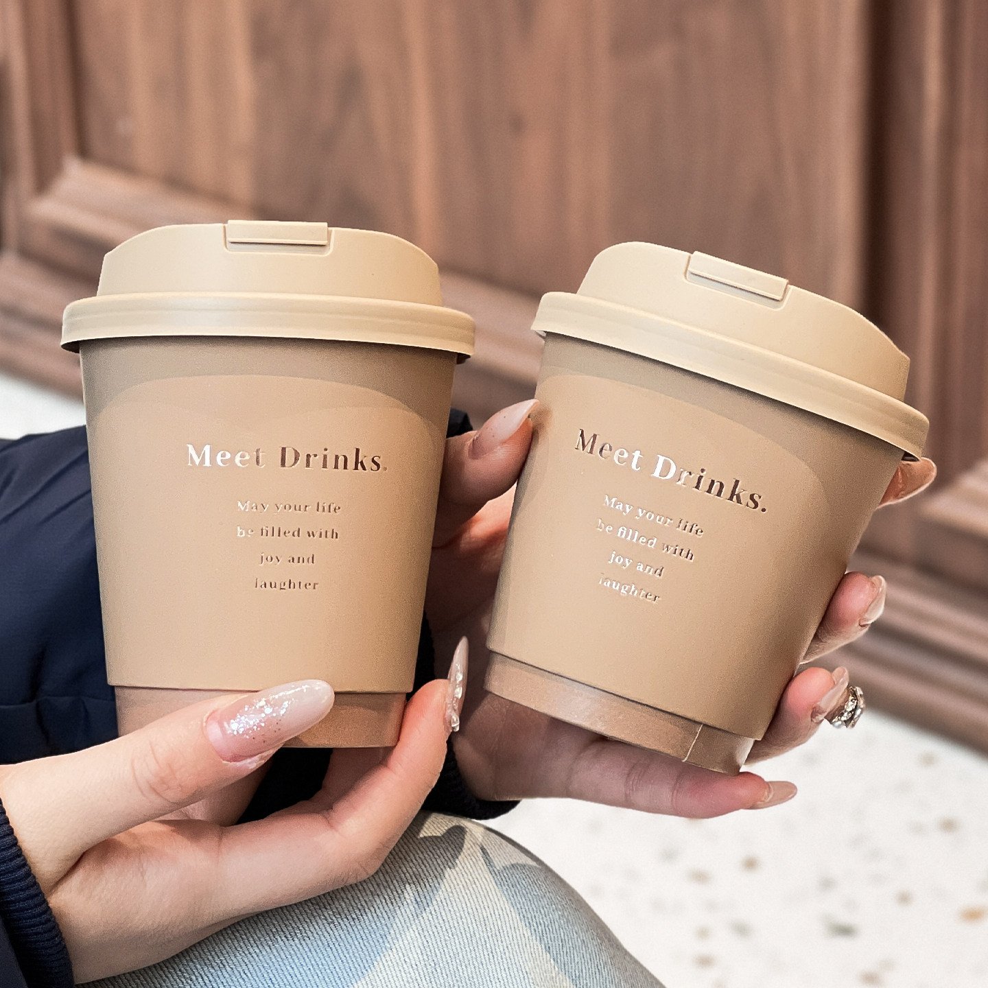 Double-wall paper cups with eco-friendly lids for hot and cold beverages