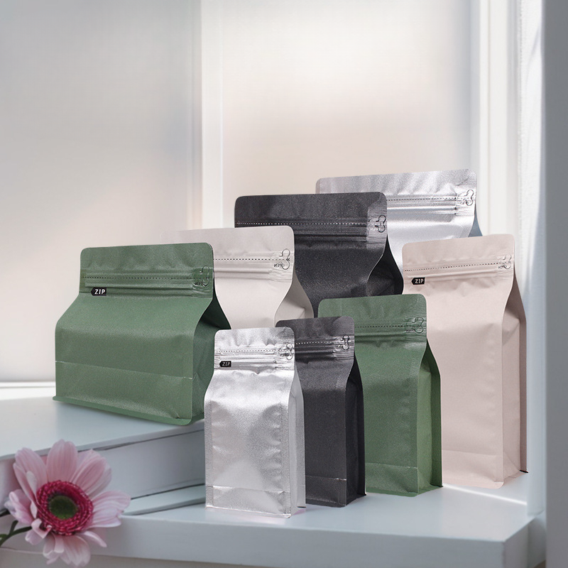 High-barrier coffee stand-up paper pouches with degassing valves by Boxivia packaging