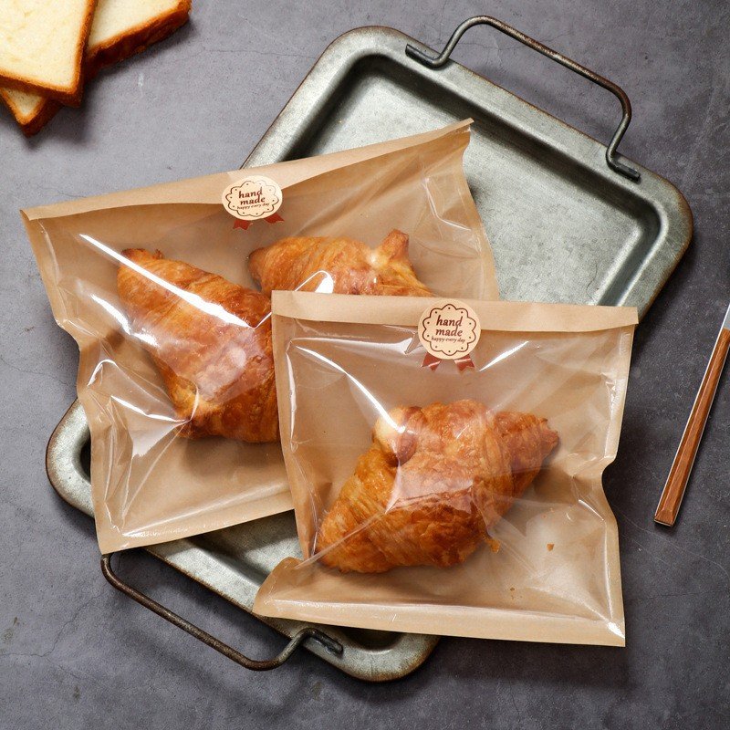 Greaseproof food packaging pouches and bakery bags